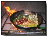 Migas con Chorizo, pimientos, panceta y uvas